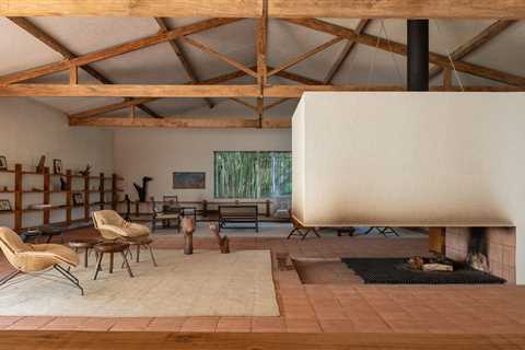 A Monumental Hearth Anchors This Agricultural Building Turned Home in Brazil